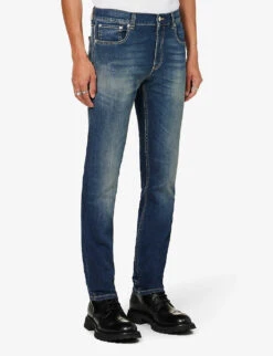 Alexander McQueen Graffiti Brand-embroidered Tapered-leg Regular-fit Stretch-denim Jeans 9 Alexander McQueen Graffiti Brand-embroidered Tapered-leg Regular-fit Stretch-denim Jeans -Gentlemen Style Shop R04153535 BLUEWASHED ALT02