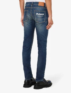 Alexander McQueen Graffiti Brand-embroidered Tapered-leg Regular-fit Stretch-denim Jeans 10 Alexander McQueen Graffiti Brand-embroidered Tapered-leg Regular-fit Stretch-denim Jeans -Gentlemen Style Shop R04153535 BLUEWASHED ALT03